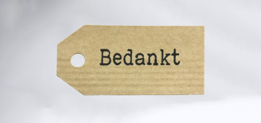 Kartonnen label met ‘Bedankt’ erop Kartonnen label met ‘Bedankt’ erop