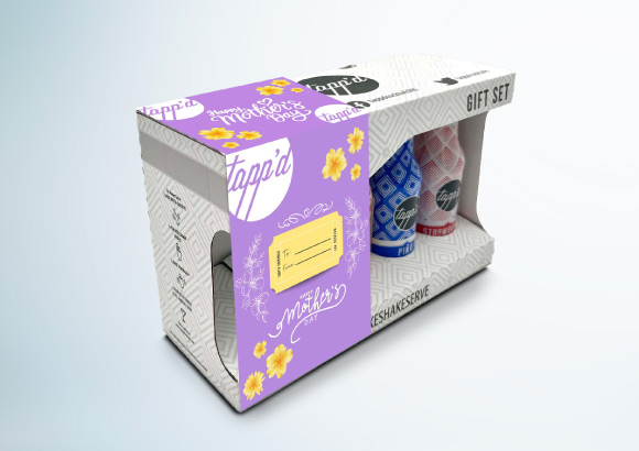 Verpakkingsoplossing met met verwisselbare sleeves in combinatie met een elegante geschenkdoos