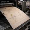 Offsetdruk van champagneetiketten op ivoor gehamerd papier Creative Labels Martelé – hoogwaardige getextureerde afwerking tijdens drukproces, geschikt voor wijn- en spirituosenetiketten, Antalis
