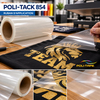 Rol POLI-TACK 854 applicatietape en verwijdering van de transparante folie op een zwart t-shirt met gouden leeuwenlogo