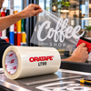 Rol transparante ORATAPE LT95 application tape en afwerking met rakel op glas